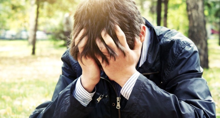 Sad-man-covering-his-face-with-his-hands-Shutterstock-800x430